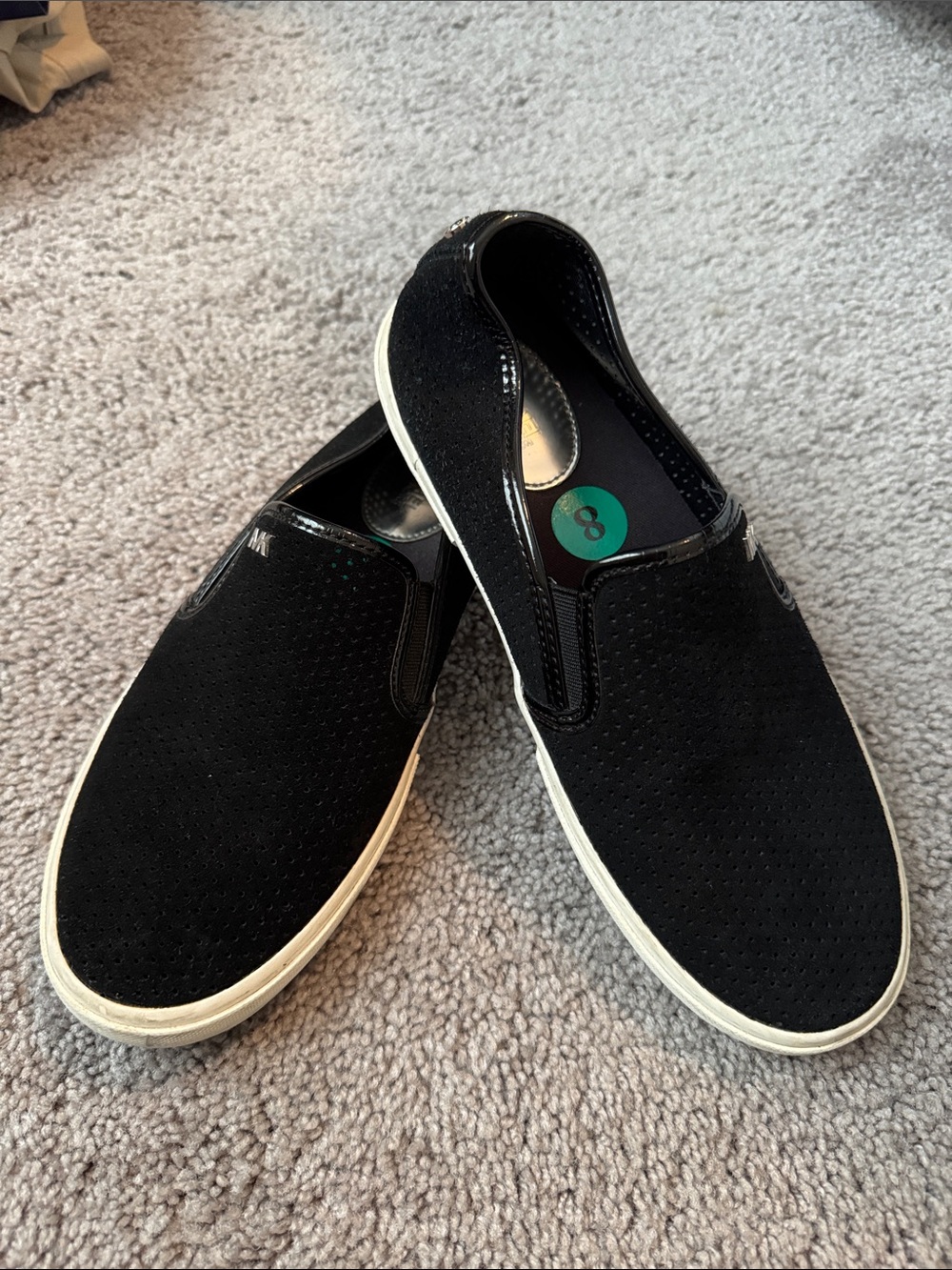 Michael Kors women’s Black Slip-On Casual Sneakers